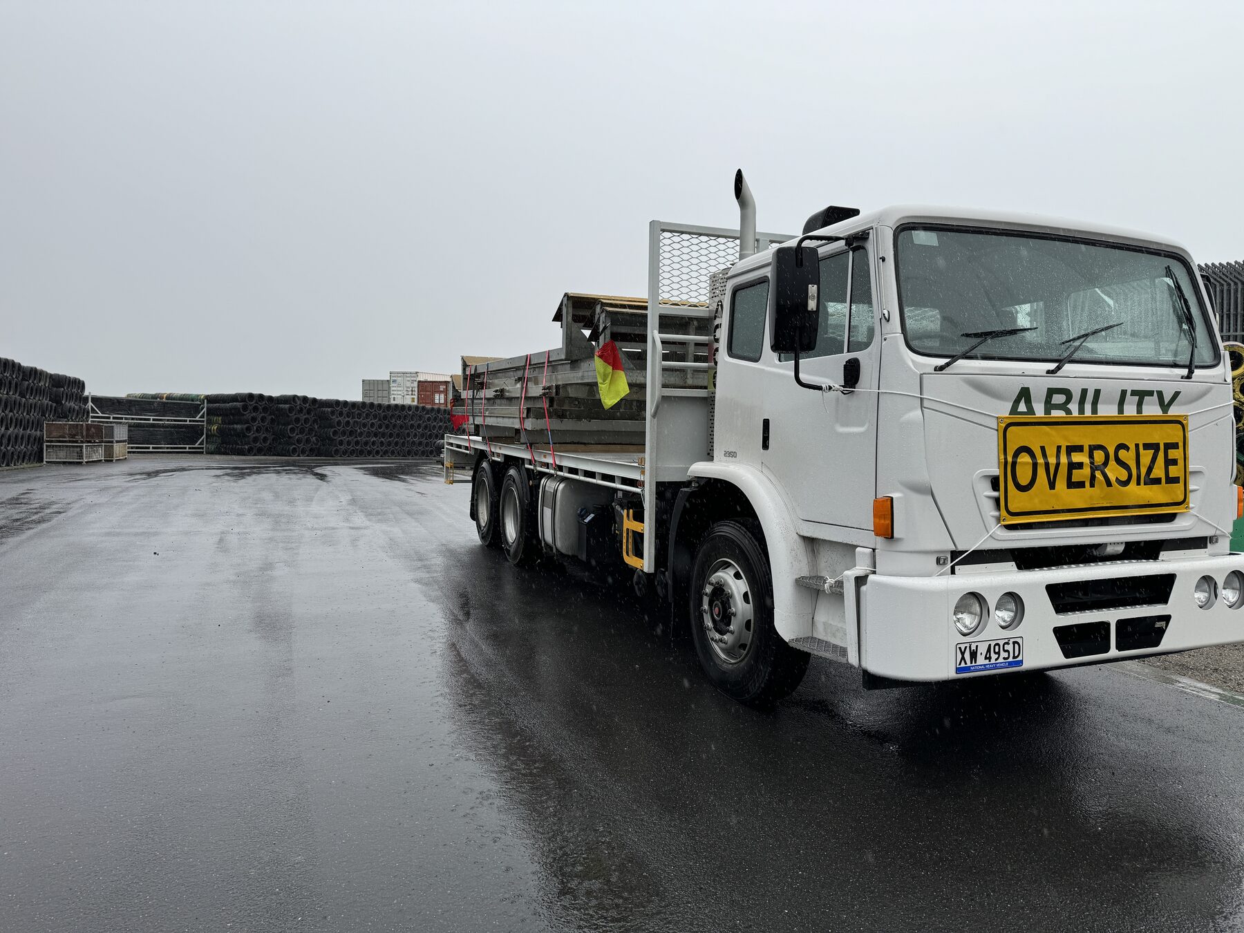 Ability Cranes oversize tray truck loaded with steel